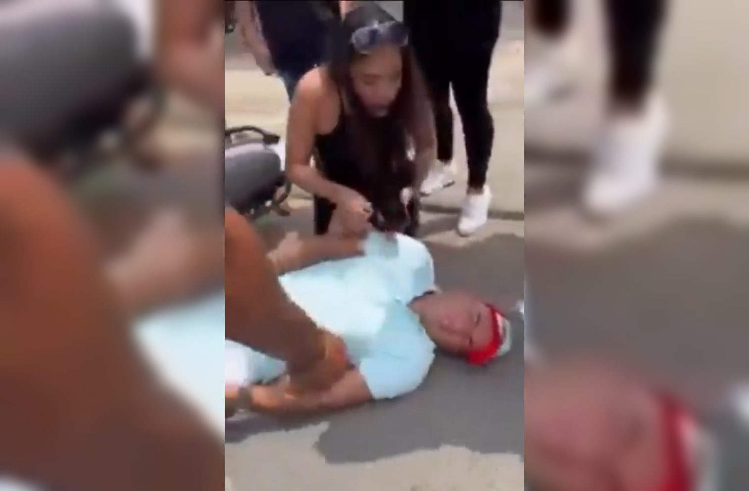 Una mujer en Colombia generó polémica al bloquear una ambulancia para exigirle la contraseña del teléfono a su novio herido en un accidente. El video se hizo viral. Foto: Cortesía.