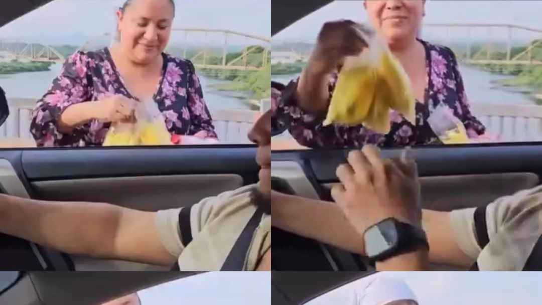Compradores "engañados" pagando $15 por tres bolsas de mangos en el puente del río Lempa. Crédito: Video viral robado de redes sociales.